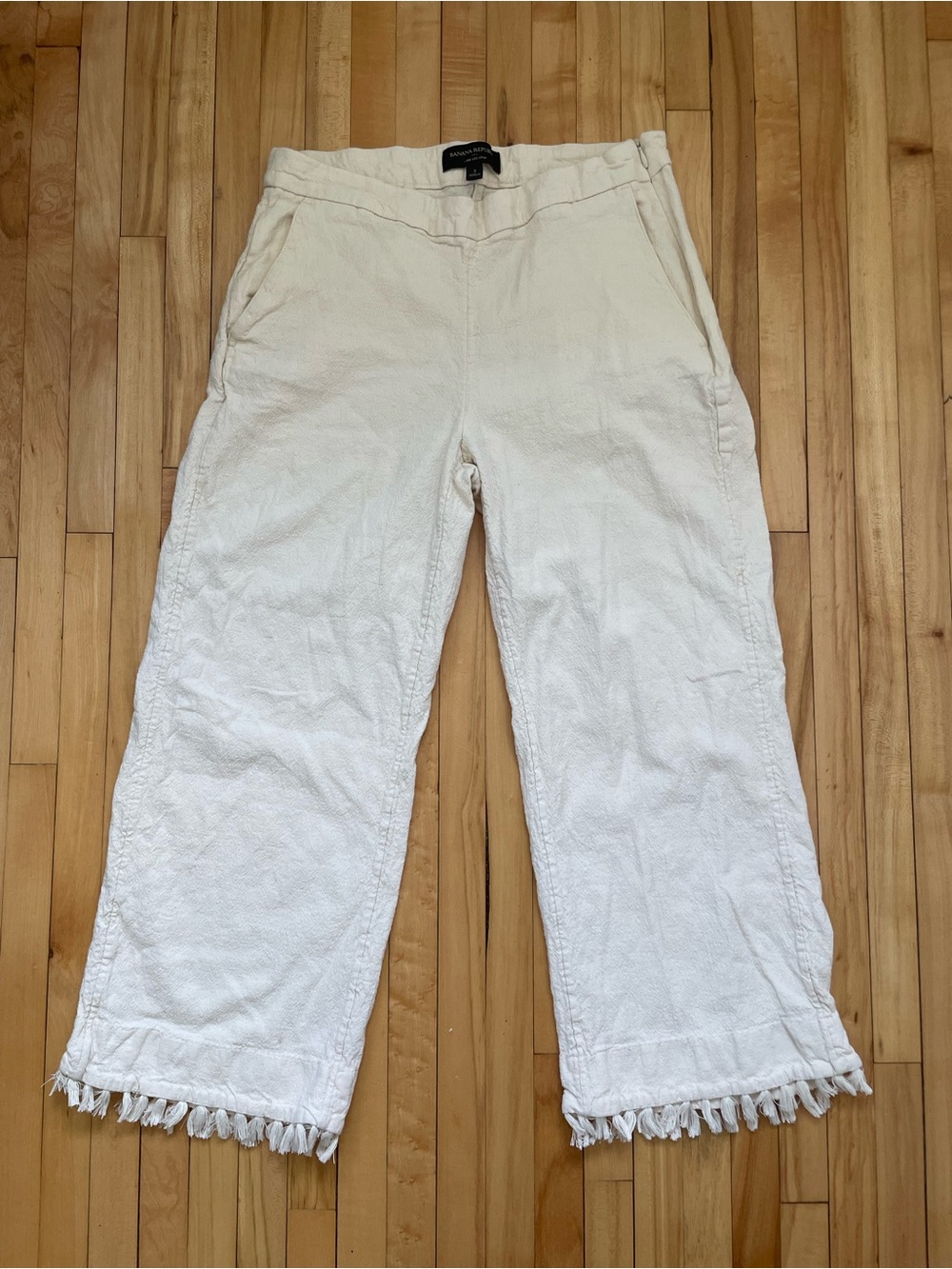 Banana Republic wide leg cream linen pants with frayed tassel hem